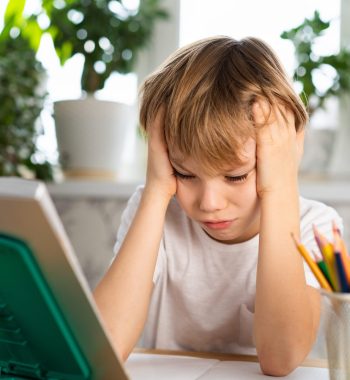 a-tired-schoolboy-does-his-homework-back-to-schoo-2026-03-10-03-09-19-utc (1)
