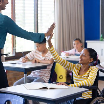 in-school-indian-female-teacher-high-fiving-stude-2026-01-09-11-57-28-utc (1) (1)
