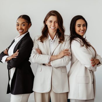 three-businesswomen-posing-with-confidence-in-stud-2026-01-08-23-02-50-utc (1) (1)